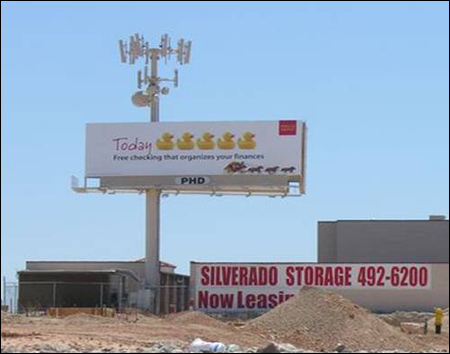 Photo: Billboard with wireless towers