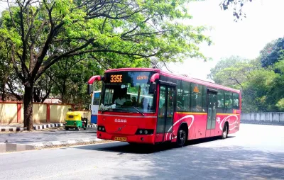 Red public transit bus in Bangalore, India.