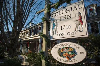 Sign for historic Colonian Inn in Concord, Massachusetts.