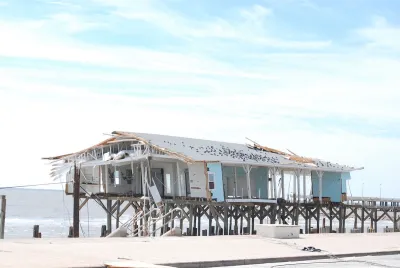damaged building on pier in Gulf of Mexico in Galveston, Texas after Hurricane Ike.