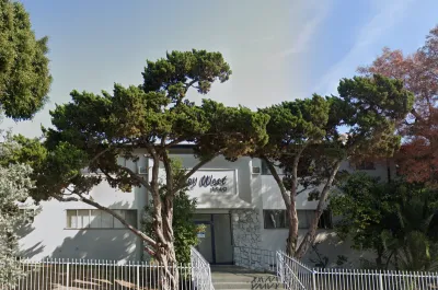Google street view of two-story white apartment building in Los Angeles, California with "Key West 1940" text above entrance.