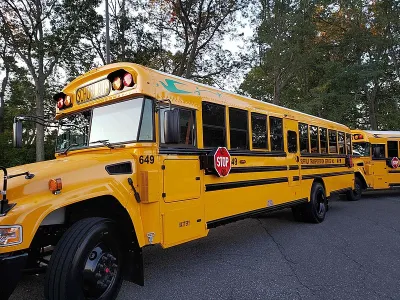 Yellow electric Blue Bird school bus
