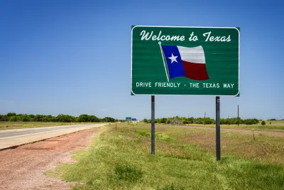 "Welcome to Texas" road sign with Texas flag and "Drive Friendly - the Texas way" slogan