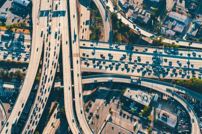 Aerial view of massive Los Angeles freeway interchange.