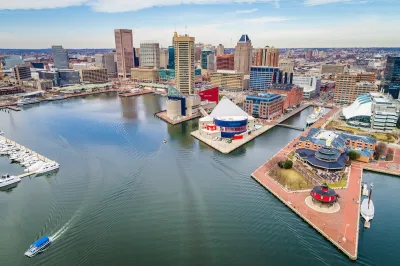 Aerial view of Baltimore's Inner Harbor with downtown skyline.