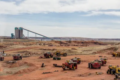 Coal mining equipment and vehicles at coal mining site in Wyoming.