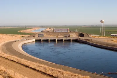 California Aqueduct channel in flat farmland area.