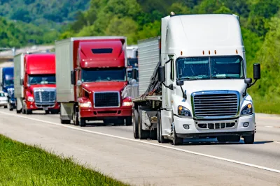 Line of 18-wheeler trucks on a highway in Tennessee