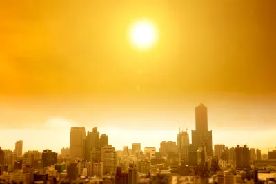 View of hazy city skyline in yellow smog indicating extreme heat.