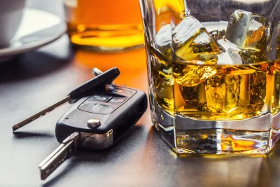 Close-up of car keys sitting on bar top next to car keys with fob.