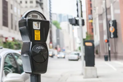 Close-up of standard grey parking meter on Chicago street.