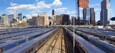 View of trainsin Hundson Yards and New York City skyline.