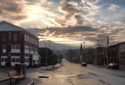 View of street in small town of Camillus, New York on a cloudy day.