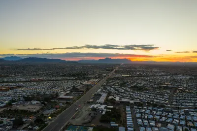 Aerial view of mobile home park next to freeway in Mesa, Arizona