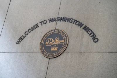 Sign on concrete wall "Welcome to Washington Metro" with WMATA seal.