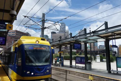 Blue and yellow light rail train at station in Minneapolis, Minnesota