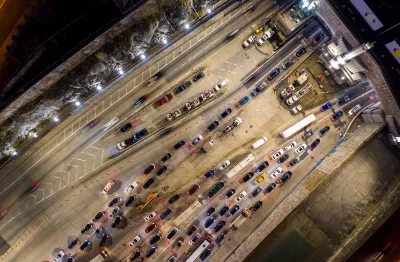 Bird's eye view of traffic entering Lincoln Tunnel in Weehawken, New Jersey heading into Manhattan, New York City.