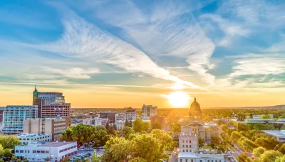 View of Boise, Idaho timeline with state capitol dome against early sunset sky