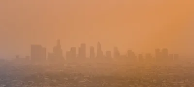 View of downtown Los Angeles, California through orange haze.