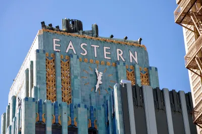 Close-up of top of ornate Art Deco blue tile Eastern building in downtown Los Angeles