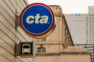 Close-up of round blue, white, and red Chigato Transit Authority "cta" logo on exterior of building.