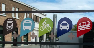 Sign with icons indicating access to multiple transportation modes in Le Havre, France