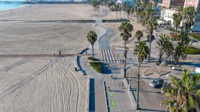 Aerial view of beach bike path and palm trees in Santa Monica, California