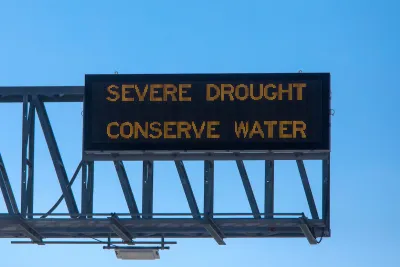 "Severe Drought - Conserve Water" freeway sign.