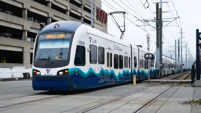 Bllue and white Link light rail train in Tukwila, Washington.