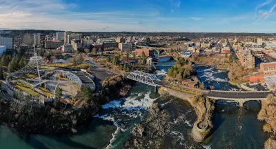 Aerial view of Spokane, Washington with river in foreground.
