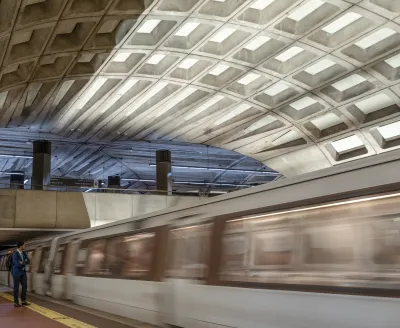 Blurred image of train passing by platform at Washington, D.C. undergroundtrain station