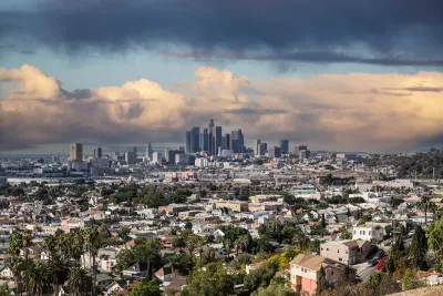 View from hilltop residential neighborhood of downtown Los Angeles, California on a cloudy day.