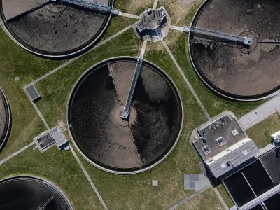 Bird-s eye view of circular retention tanks at water treatment plant