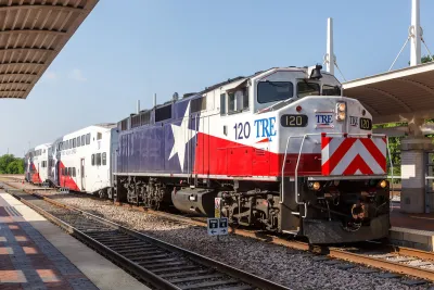 Trinity Railway Express train painted with Texas flag at station in Dallas, Texas.