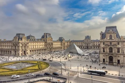 Aerial view of Louvre Museum complex in Paris, France.