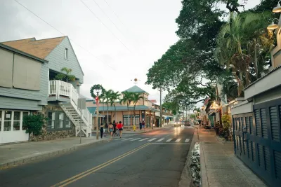 Street with two-story buildings in Lahaina, Maui, Hawaii.
