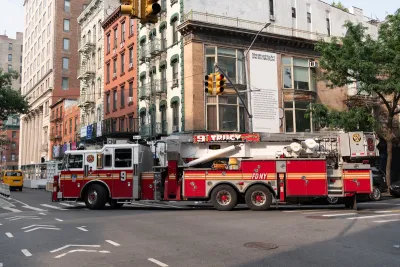 Red fire engine on street in Jersey City, New Jersey.