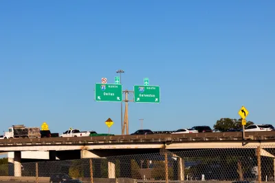 Traffic on Interstate 45 with signs leading to Dallas and Galveston.