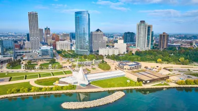 Aerial view of downtown Milwaukee, Wisconsin with Quadracci Pavilion on waterfront in foreground.