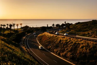 View of Palos Verdes Drive along Pacific Ocean in Palos Verdes, California at sunset.