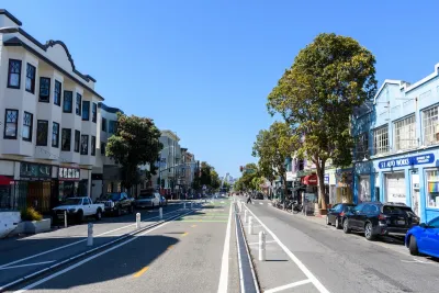 Center-running protected bike lane on Valencia Street in San Francisco, California.