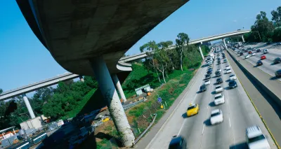 View from under tall freeway overpass in Los Angeles at intersection of I-405 and I-10.