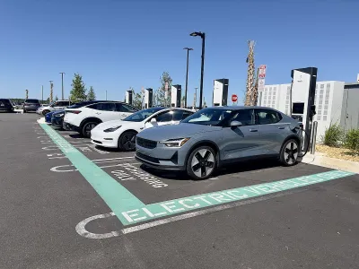 Electric car charging area in a parking lot at a Costco in Clermont, Florida.