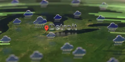 An illustration of rain clouds gathered over the U.S. Midwest, with the city of Detroit called out on the map.