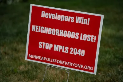 Red sign with white text opposing Minneapolist 2040 rezoning plan.