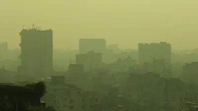 Air pollution is visible in the air around high-rise buildings in Dhaka, Bangladesh.