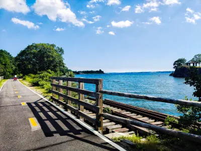 The East Bay Bike Lane runs along the water in Rhode Island.