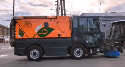 Electric bike lane sweeping truck