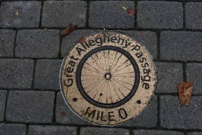 A mile marker showing mile zero of the Great Allegheny Passage, which is a bike and pedestrian path that begins in Cumberland, Maryland and ends in Pittsburgh, Pennsylvania.