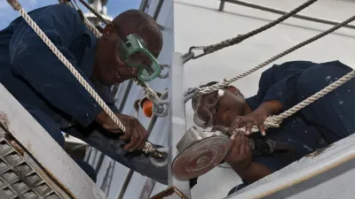 USS Arleigh Burke Sailors perform preservation maintenance